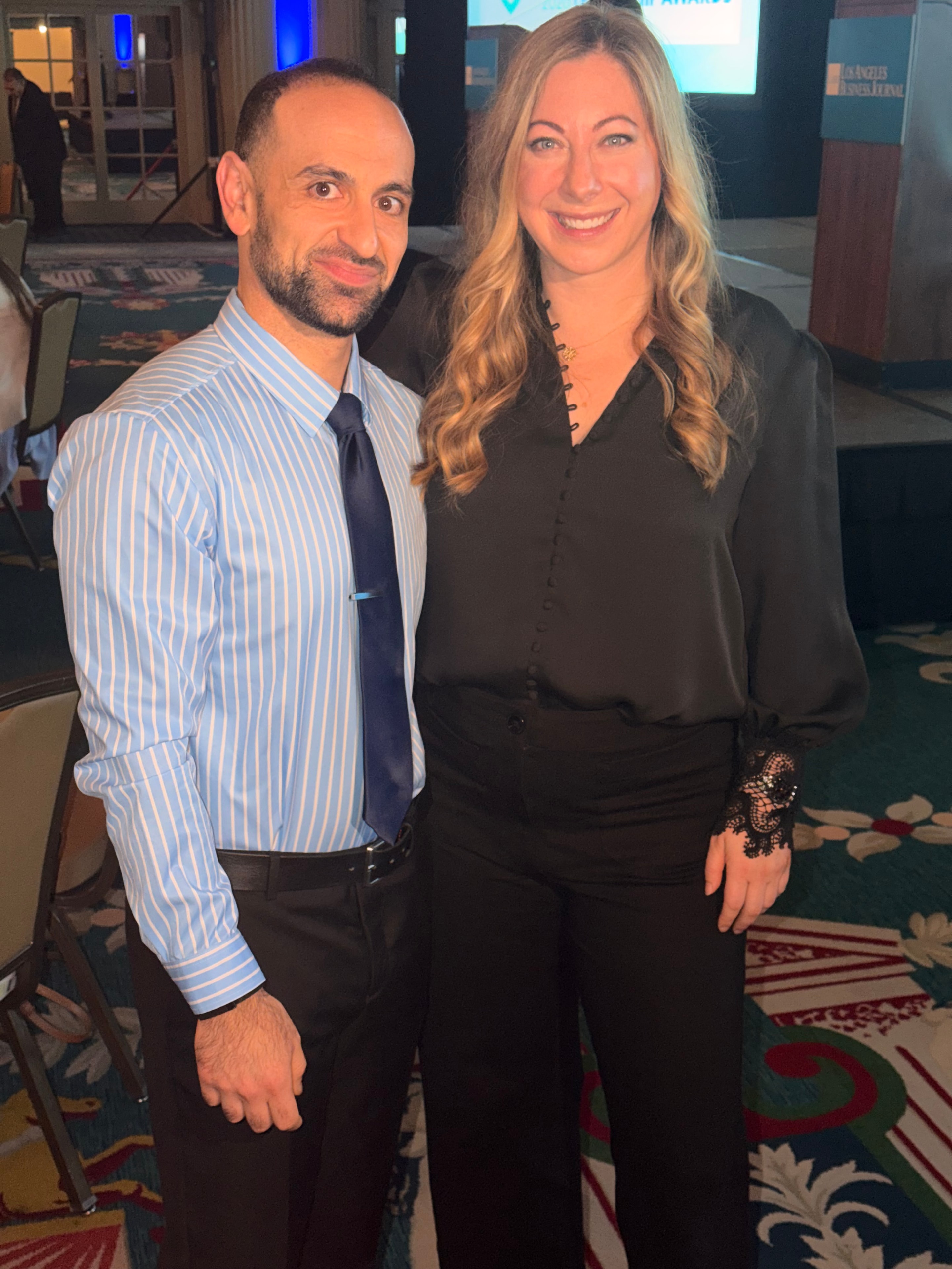 Alex Yarijanian with a healthcare leader at the AltaMed conference