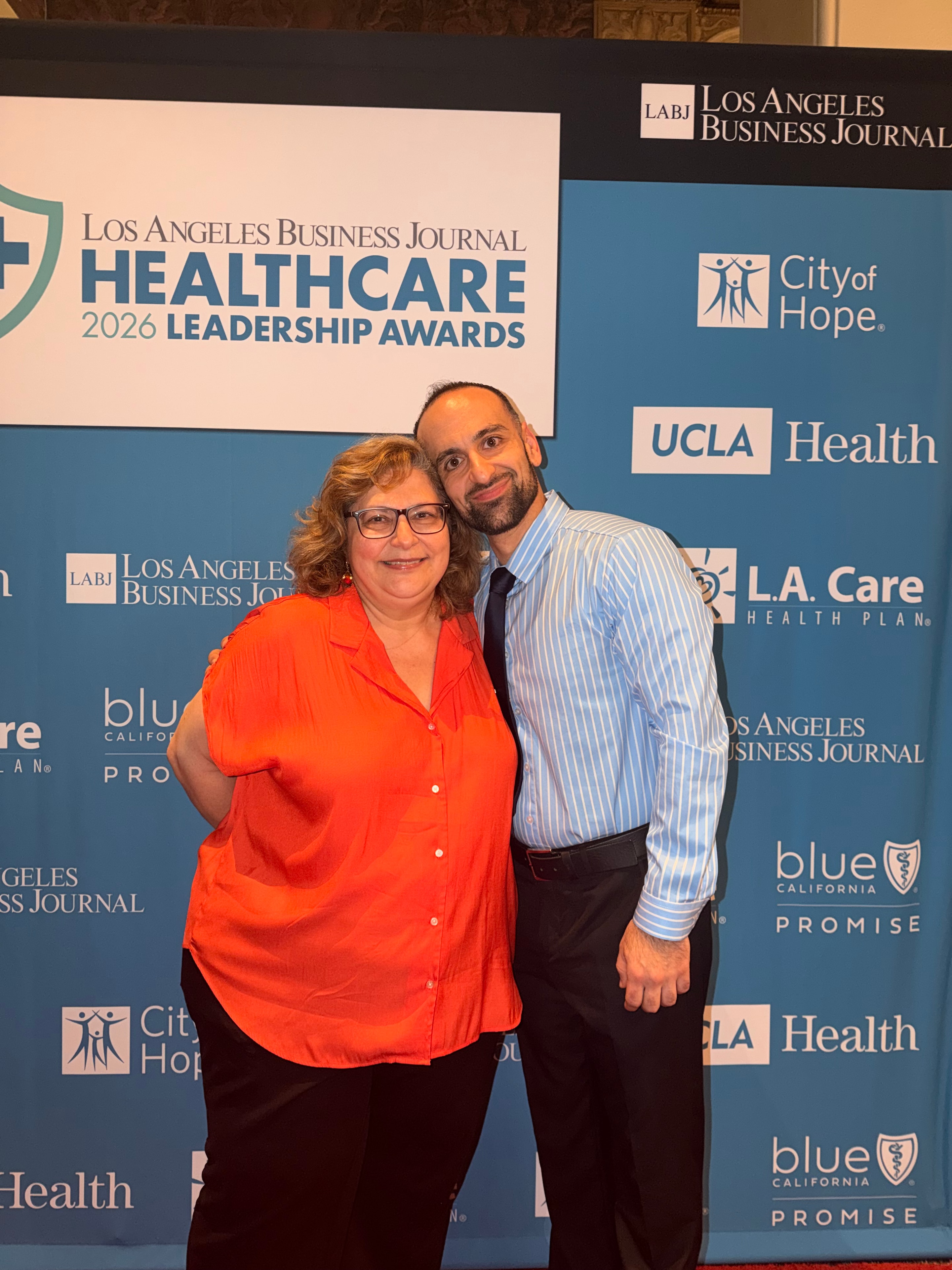 Alex Yarijanian with a healthcare leader at the Healthcare Leadership Awards