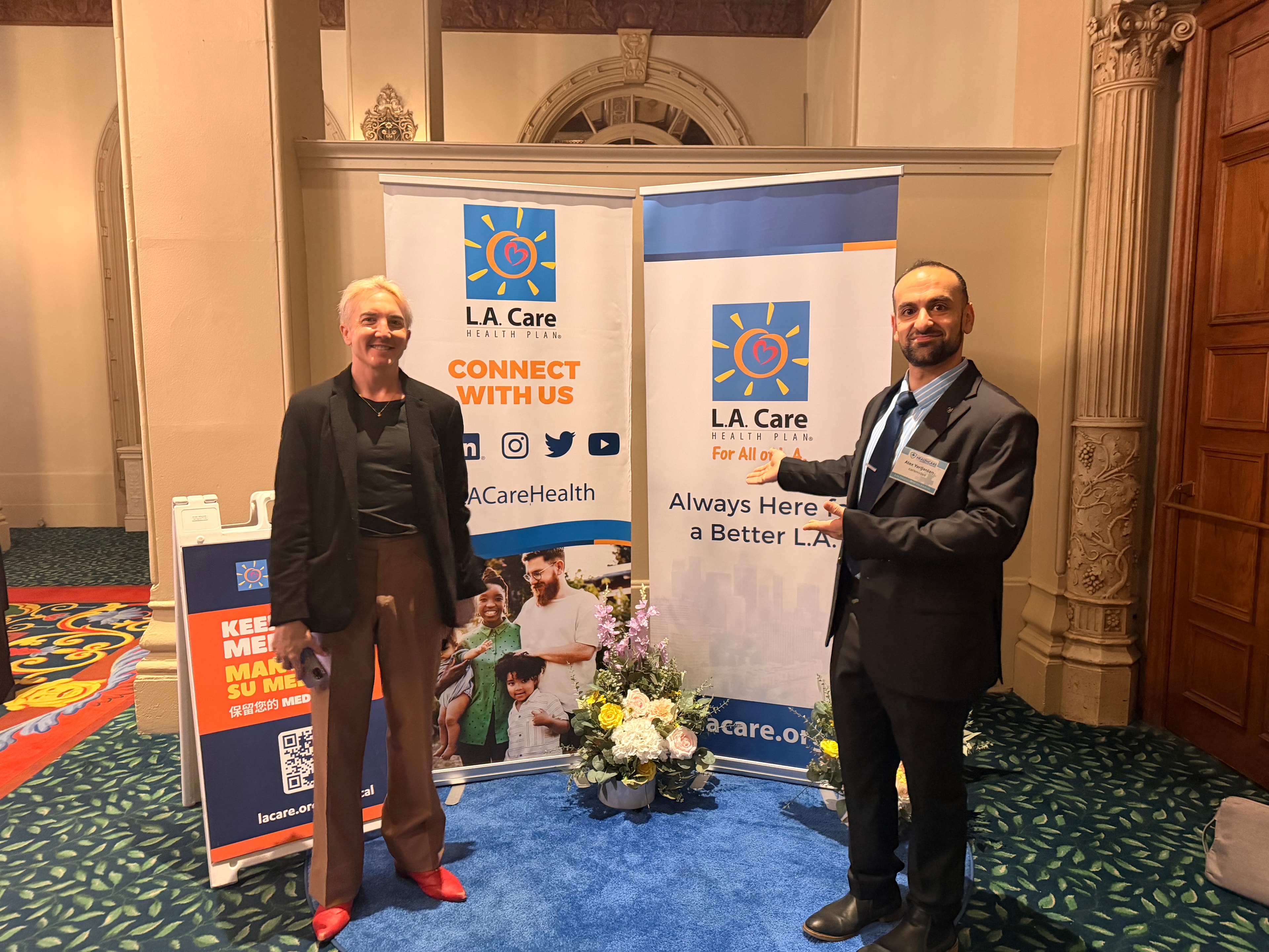 Alex Yarijanian with a healthcare leader at the L.A. Care Health Plan conference