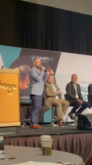 Alex Yarijanian at a panel discussion